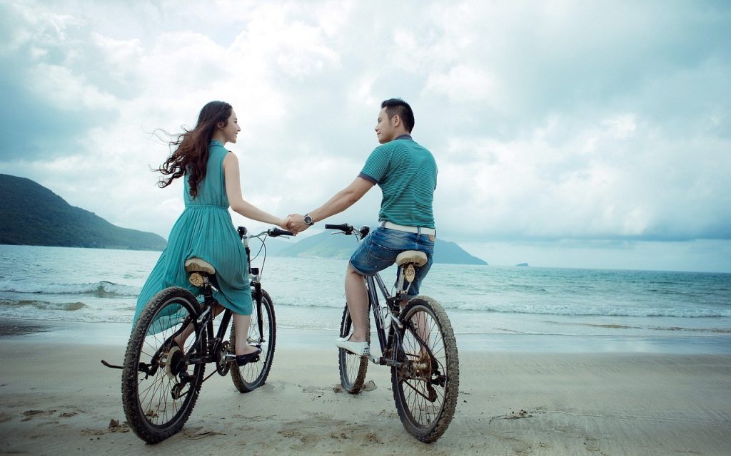 couple, beach, bicycles, bikes, holding hands, lovers, nature, together, young couple, happy couple, asian, love, holiday, summer, sea, seaside, boy, woman, girl, man, outdoors, biking, relationship